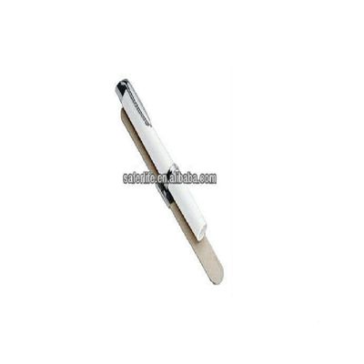 Diagnostic pen light with tongue depressor holder