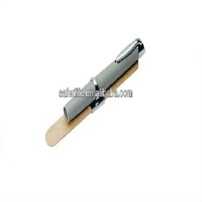 Diagnostic pen light with tongue depressor holder