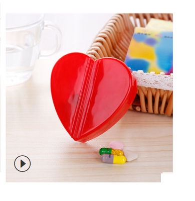 Can rotation Cute Heart shape pill box with four compartments  and can changed it with oval shape  pill holder