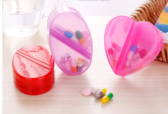 Can rotation Cute Heart shape pill box with four compartments  and can changed it with oval shape  pill holder