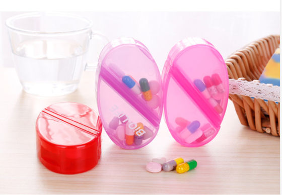 Can rotation Cute Heart shape pill box with four compartments  and can changed it with oval shape  pill holder