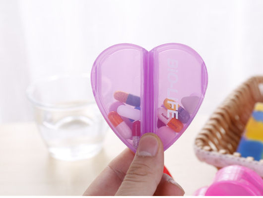 Can rotation Cute Heart shape pill box with four compartments  and can changed it with oval shape  pill holder